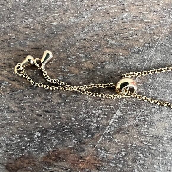 Adjustable rhinestone and ruby tone studded gold simple elegant bracelet - Picture 4 of 4